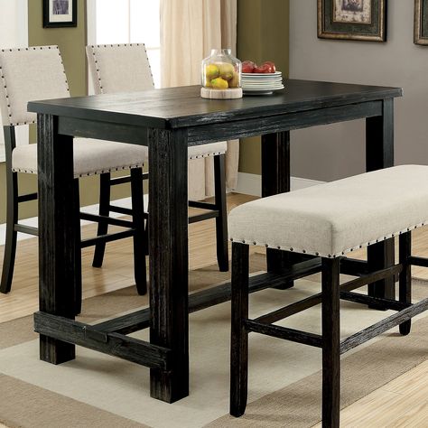 Update your dining are with this black solid wood bar table. This table features an antique black finish and boasts a lovely transitional look. The table has distressed wooden detailing and solid wooden legs. Bar Height Dining Table, Egg Chairs, Kitchen Table Makeover, Wood Bar Table, High Top Tables, Pub Set, Bar Tables, Pub Table Sets, Bar Table Sets