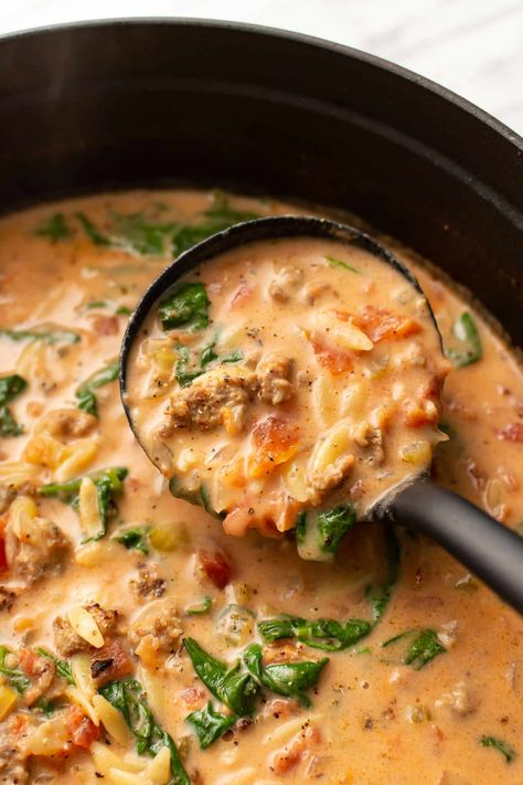 This comforting creamy sausage soup recipe has hearty orzo to make it a filling meal! It's a quick yet super satisfying soup with everyday ingredients. Creamy Sausage Soup, Italian Sausage Orzo Soup, Sausage Orzo Soup, Italian Sausage Orzo, Sausage Orzo, Orzo Soup Recipes, Sausage Soup Recipes, Italian Sausage Soup, Orzo Soup