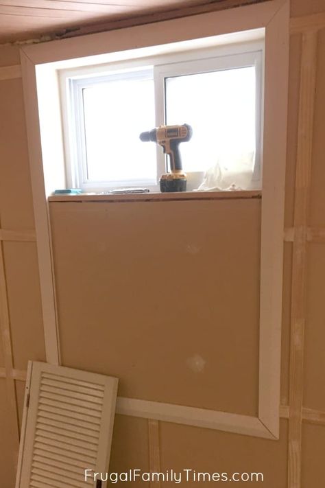 Here's how to make a small basement window look bigger and beautiful. It cost <$50! Part of our budget basement makeover. So many affordable DIY ideas! Green walls ~ white trim ~ shutters ~ wood ceiling Basement Window Treatments, Basement Window, Basement Decoration, Fake Window, Egress Window, Diy Basement, Basement Windows, Faux Window, Small Basement