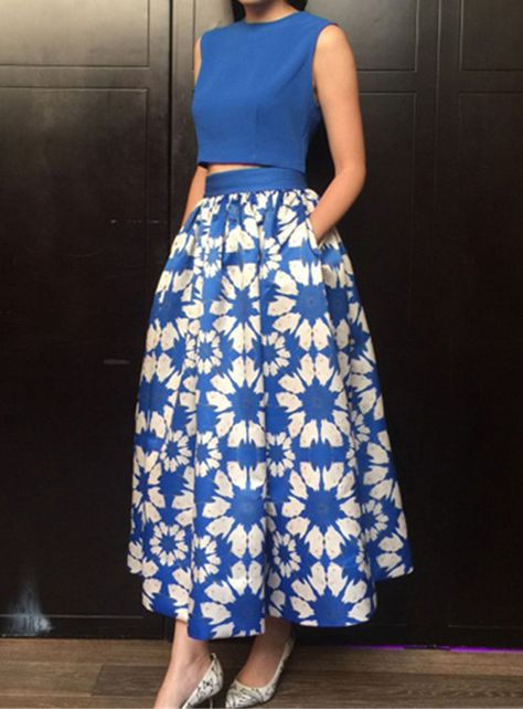 Blue Sleeveless Crop Top With Floral Skirt 42.57 Afrikaanse Mode, Pakaian Feminin, Batik Fashion, Sleeveless Crop Top, African Attire, African Fashion Dresses, Mode Inspiration, Mode Style, Fesyen Wanita