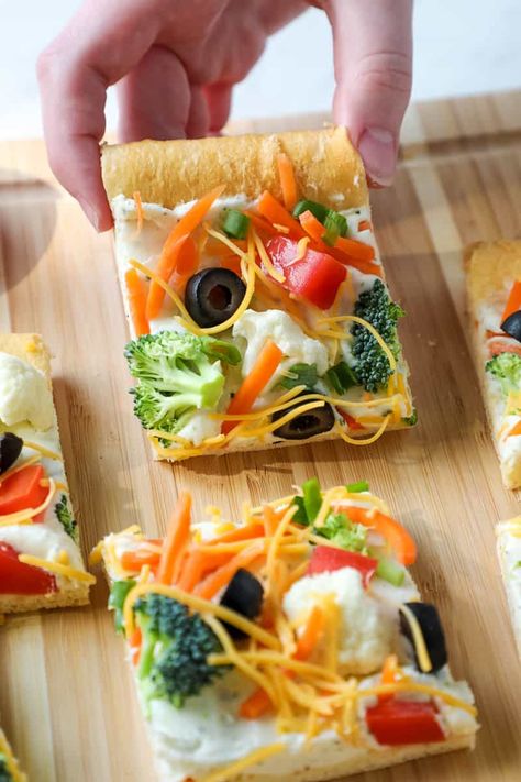 Veggie pizza is a fast and simple homemade pizza recipe. With a crescent roll crust, you'll love the simple added vegetables as the topping! Cresent Roll Veggie Pizza Recipes, Veggie Bars Crescent Rolls, Cresent Roll Veggie Pizza, Veggie Bars Recipe, Simple Homemade Pizza, Using Crescent Rolls, Veggie Pizza Appetizer, Crescent Roll Veggie Pizza, Cold Veggie Pizza