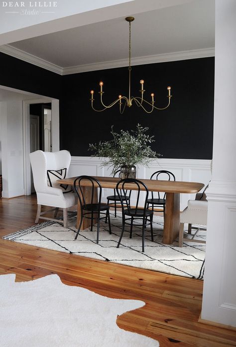 Black Dining Room With Wainscotting, Dark Wall In Dining Room, Gray And Black Dining Room, Modern Dining Room With Chair Rail, Dining Room Paint Color Ideas Modern, Black Wall Dinning Room Ideas, Wood Black Dining Room, Black Gold Wood Dining Room, Carpet Dining Room Ideas