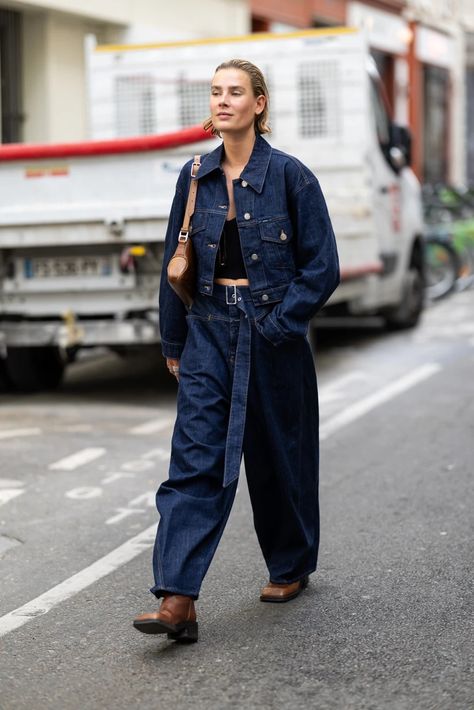 Paris Fashion Week Street Style - Coveteur: Inside Closets, Fashion, Beauty, Health, and Travel Pleated Skirt And Sweater, Denim Street Style, Beauty Makeover, Jeans Street Style, Stylish Fall Outfits, Streets Of Paris, Paris Fashion Week Street Style, All Jeans, Double Denim