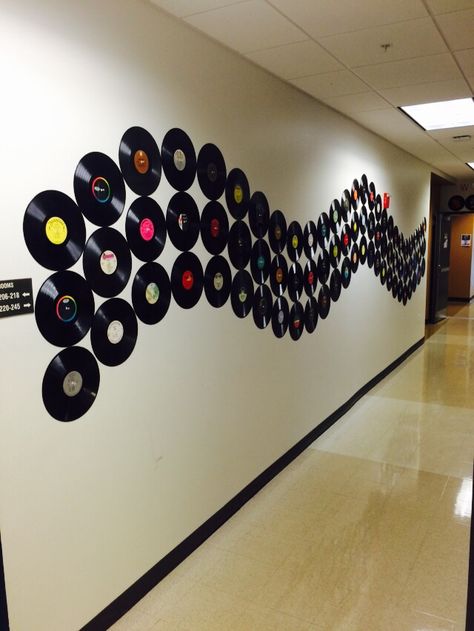 Vinyl record wave down the hallway! 70s Hallway Decorations, Disco Hallway Decorations, Record Garland, Record Room Ideas, Recording Studio Decor, School Hallway Decorations, Vinyl Bar, Records Diy, Record Decorations