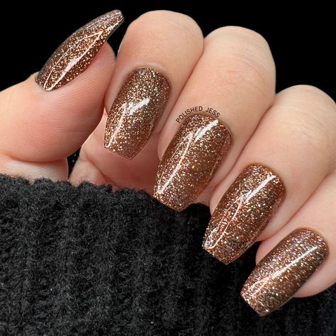 Cocktails and nails bring a glam chic vibe! Muse (P140) is a semi sheer dark brown with silver metallic glitter. With glimmering effect, this polish gives a beautiful sparkling shine to your nails.• GLITZ & GLAM: A semi sheer dark brown with silver metallic glitter for a glam chic vibe.• ﻿NAILED IT: Our regular nail polishes allow you to explore your creativity with special effects and colors that are beautiful for all-over coverage.• 5-FREE AND CRUELTY-FREE: All of our polishes are only tested Tan And Glitter Nails, Sparkly Tan Nails, Burgundy Glitter Nails Acrylic, Nails With Rust Color Dress, Glitter Nails Brown, Dark Gold Nails, Brown Hoco Nails, Glitter Fall Nails Acrylic, Brown Silver Nails