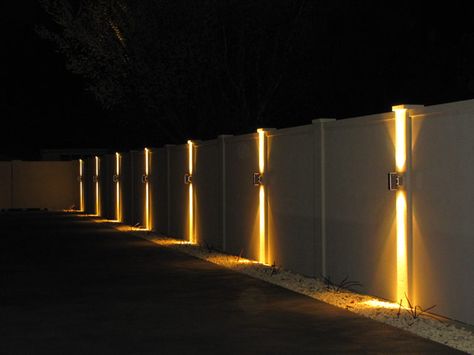 Is It Possible To Light Up Your Fence? - Straight Line Fence Outside Lights On Fence, Fence Wall Lighting Ideas, Lights On Side Of House, Light On Wall Ideas, Modern Fence Lighting, Lights For Fence Posts, Fence With Lighting, Fencing Lighting Ideas, Fence Lights Ideas