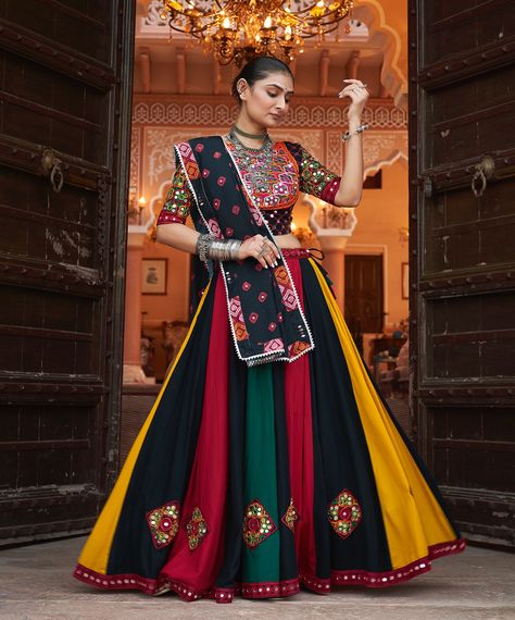 Enjoy the Navratri vibe with multi color rayon embroidery with mirror work lehenga, teamed with blouse and print with embroidery dupatta ✨⭐️ SHOP NOW 🛍️ gotifab.com [lehengacholi, garba outfits, navratri lehengas, navratri collection,navratri chaniya choli,navratri collection ] #lehengacholi #navratrilehenga #navratricollection #navratri #navratrichaniyacholi #garbaoutfit Kali Chaniya Choli For Navratri, Kali Chaniya Choli, Embroidery With Mirror Work, Chaniya Choli For Navratri, Choli For Navratri, Choli Navratri, Garba Outfit, Navratri Lehenga, Print With Embroidery