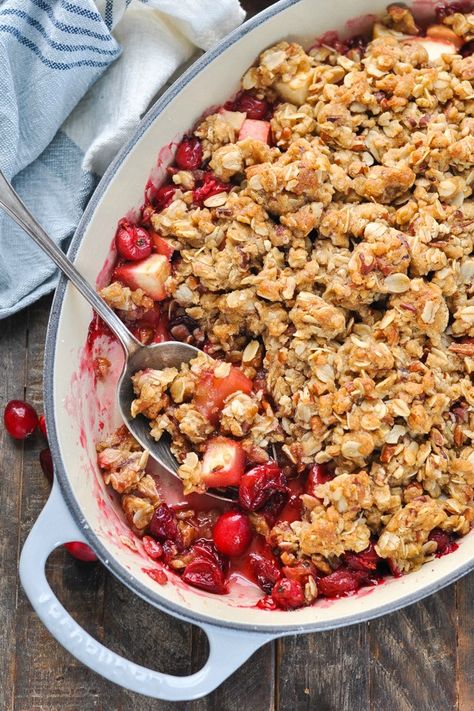 This Old Fashioned Cranberry Apple Crisp is the perfect easy dessert recipe for Thanksgiving, Christmas or any other special gathering this season! The sweet and tart fruit is topped with a buttery oat crumble for the ultimate decadent treat -- with just 10 minutes of prep! Apple Recipes Easy | Apple Recipes Dessert | Thanksgiving Dessert Ideas | Christmas Ideas Cranberry Apple Crisp With Oatmeal, Apple Cranberry Crisp Recipe With Oats, Cranberry Apple Dessert Recipes, Cranapple Crisp, Apple Rhubarb Crisp, Apple Cranberry Bread, Apple Cranberry Crisp Recipe, Apple Recipes Dessert, Cranberries Recipes