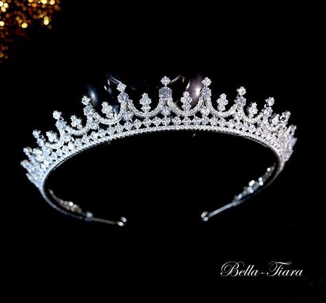 Free Complimentary Tennis Bracelet NEW to our royal collection Beautiful royal crystal wedding tiara, the perfect amount of royalty and the perfect amount of sparkle and elegance, one our newest best selling tiaras.measures approximately 1 1/4 at highest point with hoops on each end, and extended design 14k white gold plated ******************************************** *Note processing time is not shipping time, our regular Free shipping takes approx. 5-6 days to receive after shipped.With rush Poltimore Tiara, Heart Tiara, Swarovski Tiara, Crystal Wedding Tiaras, Random Products, Fav Products, Wedding Headpieces, Royal Crowns, Beautiful Tiaras