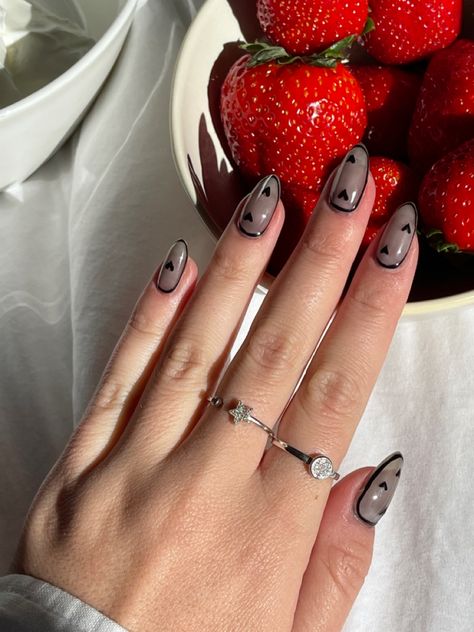 Black sheer nails with black little hearts Black Nail Designs Valentines Day, Dark Feminine Valentines Nails, Goth Oval Nails, Dark Heart Nails, Black Vday Nails, Valentines Day Nails Dark, Jelly Black Nails, Clear Black Nails, Transparent Black Nails