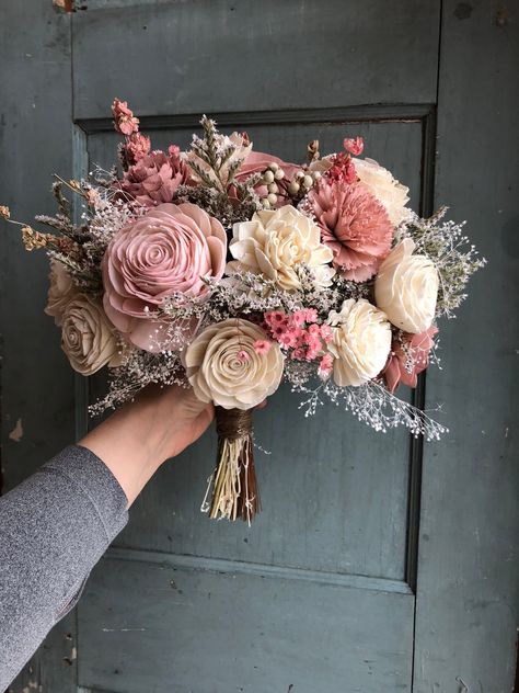 "PHOTO CREDITS to @emileeseborphotography, and @naomiderosephoto find their on instagram for more of their STUNNING work. ABOUT OUR RAVEN COLLECTION: The Raven collection features an unassuming and perfect combination of dried German statice florals and preserved baby's breath, beautiful natural Larkspur in pink, and pairs them with our signature sola wood flowers in lovely shades of dark and light dusty rose, and ivory. This is the perfect design for the bride who wants romantic and timeless, b Forever Flower Bouquets, Dusty Pink Weddings, Laura Wood, Wood Flower Bouquet, Cottage Rose, Dusty Rose Wedding, Rose Wedding Bouquet, Rose Wood, Wood Flowers