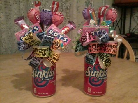 More soda can bouquets i made Coke Bouquets, Soda Can Bouquet, Soda Bouquet, Graduation Candy Bouquet, Wrestling Banquet, Candy Boquets, Candy Bar Cards, Candy Bar Bouquet, Sweet 16 Candy