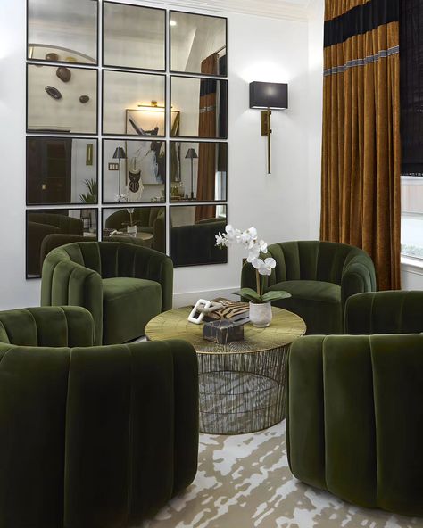 Elevating every corner with luxurious details ✨ This cozy yet sophisticated sitting area is the perfect blend of elegance and comfort. We chose rich, deep green velvet chairs to create a warm and inviting space, complemented by a stunning gold coffee table that adds a touch of glam. The mirrored wall not only amplifies the light but also adds a striking focal point that enhances the room's grandeur. At Three Hummingbirds Design, we take pride in crafting spaces that reflect your unique styl... Green Velvet Chairs, Green Velvet Chair, Velvet Chairs, Ed Design, Gold Coffee, Mirrored Wall, Gold Coffee Table, Eclectic Home, Formal Living