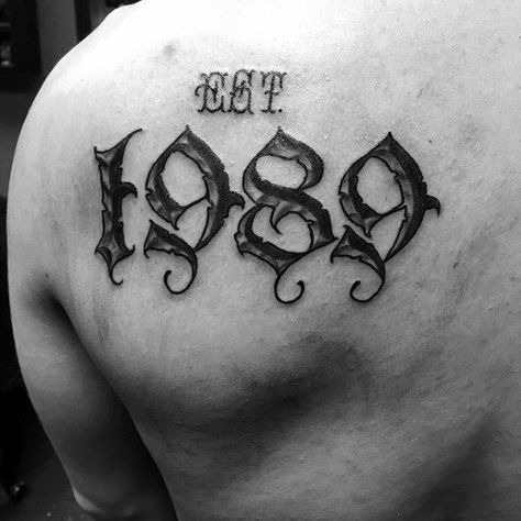 Est 1989 Numbers Mens Shoulder Blade Tattoo 1989 Tattoo Number, Est 1989 Tattoo, Est Tattoos For Men, 1989 Tattoo Ideas, Numeral Fonts, 1989 Tattoo, Est Tattoos, 70 Number, Numbers Tattoo