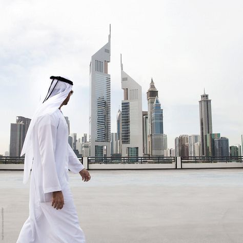 Businessman wearing traditional dress. Business district, Dubai. U.A.E by Hugh Sitton - Stocksy United #stockphoto #stock #diversity #business Corporate Sponsorship, Dubai Photoshoot, Dubai Business, Dubai Aesthetic, Business Setup, Dress Business, Business District, Business Technology, Business Dresses