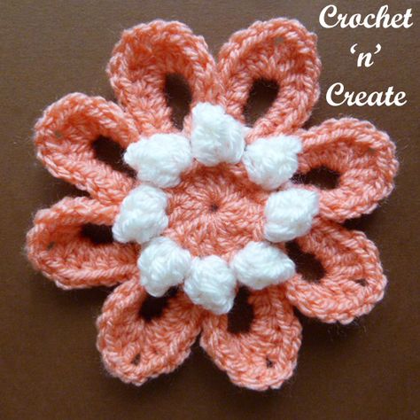 This crochet popcorn flower can be added to any type of crochet project, use for headbands, mobile covers, purses, hair clips etc. or make ............. Crochet Puff Flower Projects, Popcorn Flower Crochet, Crochet Popcorn Stitch Flower, Small Crochet Puff Flower, Crochet Popcorn Stitch, English Terminology, Crochet Flower Pedals, Crochet Small Flower Applique Free Pattern, Crochet Popcorn