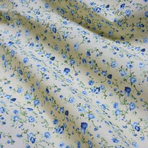 Cream Polycotton Fabric with Delicate Blue Flowers (Per Metre)