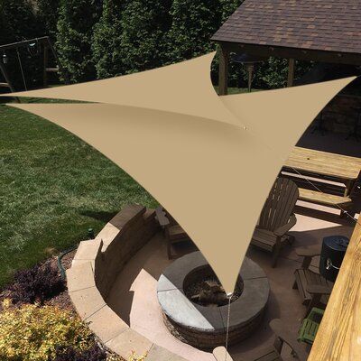 These Shade Sails protect and shade your outdoor areas. Also known as Sail Shades, these unique coverings make beautiful additions to your patio, backyard, or other outdoor areas, and they provide excellent protection from the sun and its harmful UV radiation. Color: Sand | yeahmart Waterproof 9.8' Triangle Shade Sails in Brown, Size 118.0 W x 118.0 D in | Wayfair Garden Sail, Triangle Shade Sail, Triangle Sun Shade, Sun Shade Canopy, Sail Canopies, Sun Shade Sail, Sun Shelter, Waterproof Tent, Tent Tarp