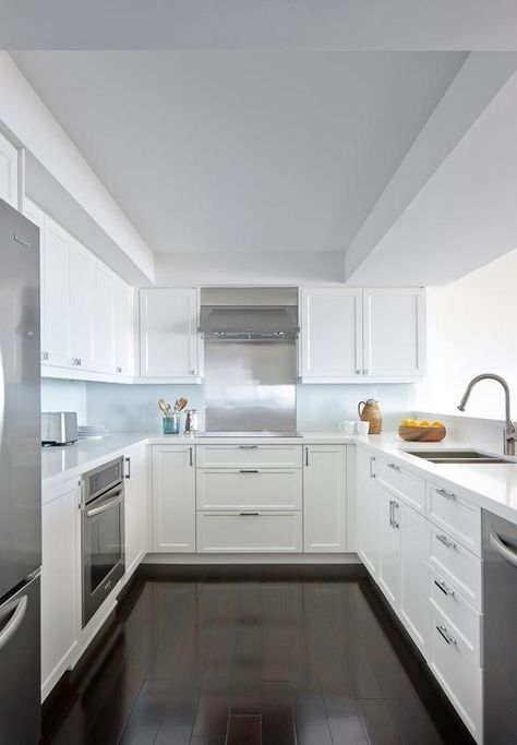 U-shaped-white-kitchen-stainless-steel-appliances-Remodelista Kitchen Layout U Shaped, Small U Shaped Kitchen, Küchen In U Form, White Shaker Kitchen Cabinets, Kitchens Ideas, Shaped Kitchen, Galley Kitchen Remodel, White Kitchen Remodeling, Decorating Kitchen