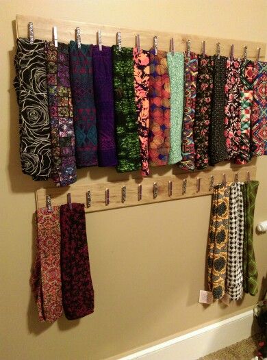 The Wall of LuLaRoe Leggings! Fun easy DIY project to organize leggings, skirts and more! Washi tape decorated clothespins mounted with Gorilla glue to boards. Use Command Strips to attach to wall. Easy to move, no damage! Leggings Storage Ideas, Organize Leggings, Legging Storage, Decorated Clothespins, Lularoe Room, Ugly Things, Closet Drawer, Habitat Restore, Floor Boards