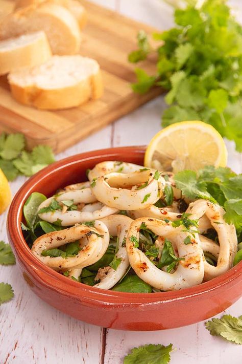 Grilled calamari with lemon and cilantro – The Tasty Chilli Calamari Rings Recipe, Bbq Squid, Spanish Tomato Bread, Deep Fried Calamari, Calamari Rings, Grilled Calamari, Mediterranean Appetizers, Calamari Recipes, Grilled Squid