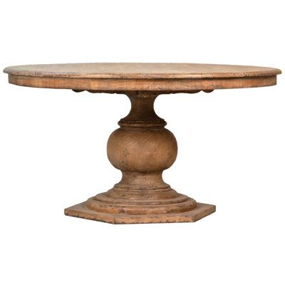 Crafted from reclaimed pine wood, this dining table has rustic elegance and timeless appeal. Featuring a carved pedestal base with a unique globe-like center and a 59-inch round tabletop. Finished in a beautiful, antique wash that brings out the natural grains and texture of the reclaimed wood. | One Allium Way® Yves 59-inch Round Reclaimed Pine Antique Natural Carved Pedestal Dining Table Wood in Brown / Green | 30 H x 59 W x 59 D in | Wayfair Dovetail Furniture, Round Pedestal Dining, Round Pedestal Dining Table, Trestle Dining Tables, Large Dining Table, Reclaimed Pine, Pedestal Dining Table, Table Ronde, Salvaged Wood