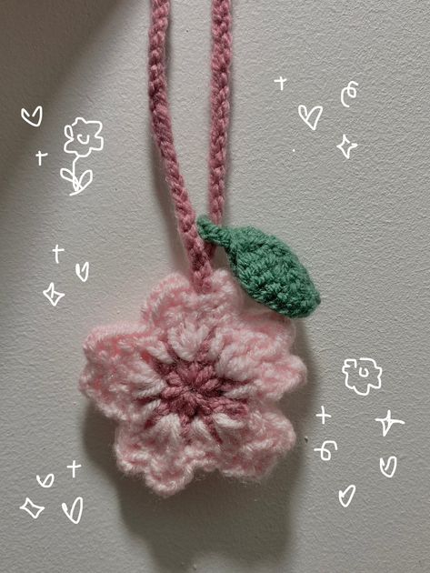 Adorable little Sakura/cherry blossom charm, perfect to glamourise your bag or act as a headphone wrap 🌷🌸 the loop may be adjusted accordingly and it is approximately 16cm in length. Made To Order Please keep in mind that delivery times are an estimate and if you have any further enquiries please do not hesitate to message me!  I also take other colour requests 🍓 Crochet Sakura Keychain, Cherry Blossom Accessories, Sakura Crochet Pattern, Crochet Pink Ideas, Headphone Crochet Accessories, Crochet Headphone Charm, Bag Charms Crochet, Keychain Crochet Ideas, Crochet Headphone Accessories