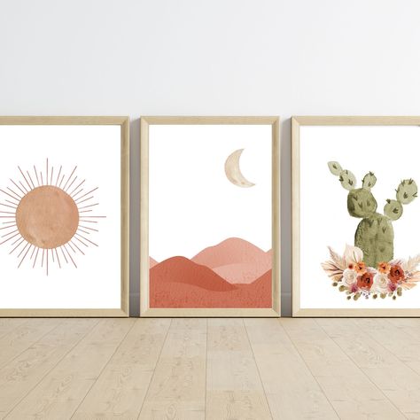 Infuse a touch of Boho Southwest enchantment into your girl's space with our "Desert Rose Set" -- a set of three digital prints capturing the allure of a rose gold sun, a stunning landscape in hues of pink with a pearl moon, and whimsical cactus adorned with flowers. Key Features: Set of three Boho Southwest-themed digital prints Features a pink landscape with a pearl moon, and cactus with flowers Perfect for Girls' Nursery, Bedroom, or Playroom Receive five 300 dpi JPG files for stunning detail Pink Desert Nursery, Desert Nursery Girl, Cactus Nursery Girl, Desert Theme Nursery, Desert Nursery Theme, Western Kids Rooms, Southwestern Nursery Decor, Desert Boho Decor, Southwestern Nursery