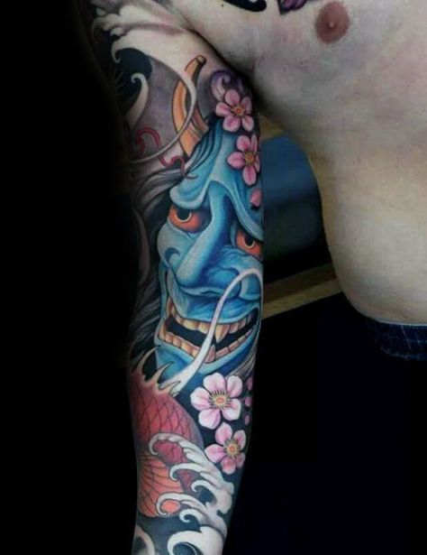 Blue Demon Mask With Cherry Blossom Flowers Male Sleeve Tattoos Neo Japanese Tattoo Sleeve, Cherry Blossom Tattoo Ideas, Hannya Maske, Japanese Demon Tattoo, Japanese Leg Tattoo, Oni Mask Tattoo, Japanese Tattoos For Men, Oni Tattoo, Hannya Mask Tattoo