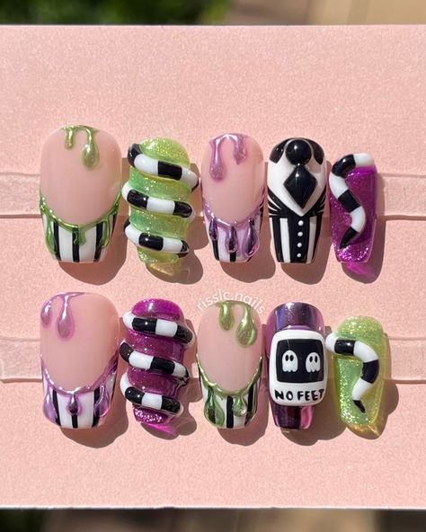 Beetlejuice Beetlejuice Beetlejuice 👻 did I go a bit over board on this set? Possibly. Am I absolutely in love with them? 100% 😂👻✨💖🐍 these were SO fun to do 💖 • base color is Enamored from @esvynails and 3d gel is from @nailzbydevshop All @risslc.nails sets are completely customizable, DM me to get your order started 🤗💖💅🏽✨ • • • #beetlejuice #beetlejuice2 #beetlejuicenails #halloweennails #spookynails #spookyseason #halloween2024 #halloweennails2024 #pressons #3dnails #3dnailart Beetlejuice Nails Design, Edward Scissorhands Nails, Bettle Juice Nail Ideas, Invader Zim Nails, Halloween Gel Nails Ideas, Beetlejuice Nail Designs, Halloween Nails Beetlejuice, Beetlejuice Nail Art, Beetle Juice Nails