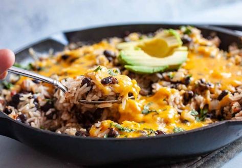 This easy cheesy rice and beans is all made in a single skillet! It has great flavors and can be served as a side dish or as an entree served with flour tortillas. YUM! macheesmo.com #cheese #easyrecipes #riceandbeans #mexican #texmex Rice And Beans Meal, Easy Cheesy Rice, Rice And Beans Recipe, Beans Beans, Cheesy Rice, Easy Rice, Mild Salsa, Rice And Beans, Recipe Vegetarian