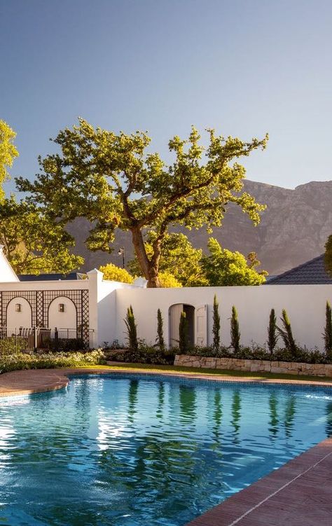 Leeu House, an exclusive retreat in the scenic Franschhoek Valley, Cape Winelands, South Africa. Franschhoek South Africa, Winelands South Africa, House South Africa, South Africa Travel, Western Cape, Garden Features, East Africa, Infinity Pool, Indian Ocean