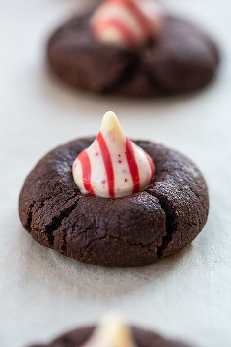 Good Lord above, do I love Christmas cookies. And Christmas. And these Peppermint Kiss Chocolate Cookies because they are everything that a cookie should Peppermint Kiss Chocolate Cookies, perfect chewy, fudgy chocolate cookies that are topped with a white chocolate peppermint kiss after baking. Mint Kisses Recipes, Chocolate Mint Kiss Cookies, Christmas Cookies Peppermint Kiss, Choc Kiss Cookies, Choc Peppermint Cookies, Chocolate Peppermint Kiss Cookies, Cookies With Peppermint Kisses, Cookies With Peppermint, Mint Truffles