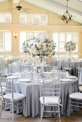 Trendy Wedding Colors 2019 ★ wedding colors 2019 silver sage tablecloth tall white flower centerpiece luminairefoto Grey And White Wedding Decor, Sage Tablecloth, Trendy Wedding Colors, Silver Chiavari Chairs, White Flower Centerpieces, Grey Wedding Theme, Silver Wedding Theme, Wedding Reception Chairs, White Wedding Decor