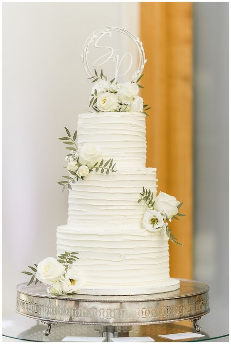 A gorgeous three tier wedding cake adorned with fresh  flower clusters, we love working with suppliers as local florists to Botleys mansion, Surrey Elegant Modern Wedding Cake, Botleys Mansion, Three Tier Wedding Cake, Three Tier Cake, Elegant Modern Wedding, Gorgeous Wedding Cake, Modern Wedding Cake, White Wedding Cake, Wedding Cakes With Flowers