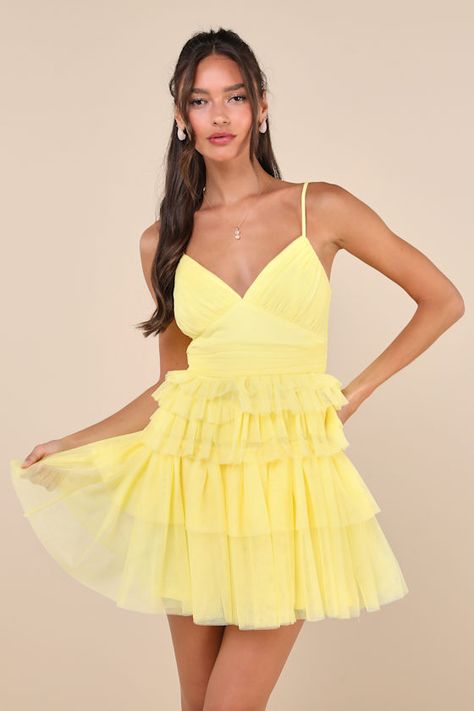 An attention-worthy look like the Lulus Special Poise Yellow Tulle Pleated Sleeveless Tiered Mini Dress will have everyone in awe all night long! Layers of sheer tulle mesh shape this iconic dress that features a pleated, sleeveless bodice, a flirty V-neckline, and adjustable spaghetti straps. A flattering, set-in waist sits atop a flouncy, tiered skirt that finishes at an alluring mini hem. Hidden back zipper/clasp. Fit: This garment fits true to size. Length: Mid-thigh. Bust: Great for any cup Yellow Fringe Dress, Loose Fitting Hoco Dresses, Yellow Short Formal Dress, Chiffon Homecoming Dress, Fluffy Hoco Dresses, Flirty Summer Mini Dress With Tulle Skirt, Spring Dresses With Spaghetti Straps And Tulle Skirt, Chic Tulle Dress With Spaghetti Straps, Summer Mesh Dress With Tulle Skirt For Night Out