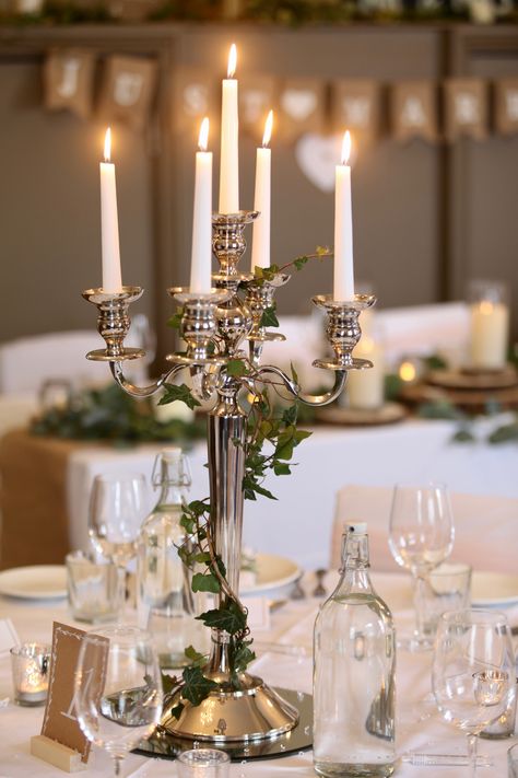 Nothing says elegant like a candelabra, it is simply a tale as old as time.  #wedding #weddinghire #weddingprops #weddingpropshop #candelabra #candles #taleasoldastime Simple Candelabra Centerpiece, Wedding Table Candelabras, Candleopera Centerpieces Wedding, Silver Candelabra Centerpiece, Candlebra Wedding, Wedding Candelabra Centerpiece, Candlebra Centerpiece, Candleabras Centerpiece, Candleabras Wedding