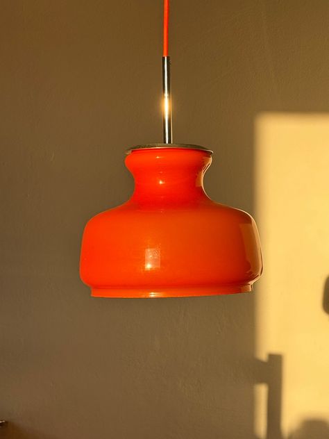 Vintage Opal Glass Pendant Lamp / Orange Glass Ceiling Lamp / MCM Pendant Lamp / Mid Century Modern Pendant Lamp / 70s Lamp Vintage Pendant Opaline Glass Light / Made in Yugoslavia 60s / Orange Ceiling Light / Mid Century Pendant Lamp / Vintage Light Fixture Orange vintage opaline lamp, made in the 70s of the last century in Yugoslavia. The glass is orange on the outside, white on the inside. In excellent vintage condition and fully functional. The lamp is rewired and the cable length can be easily reduced. A standard Edison E27 screw-in lamp is required. Please review all photos as they are part of the description. Dimension Diameter 26 cm All electrical components are new. For more great vintage pieces visit my shop https://www.etsy.com/shop/RetroExYu?ref=l2-about-shopname Shipping all o Orange Ceiling, Dark Wooden Furniture, 70s Lamp, Home Decor Dining Room, Mid Century Ceiling Light, Lamp Mid Century Modern, Decor Dining Room, Vintage Light Fixtures, Glass Ceiling Lamps