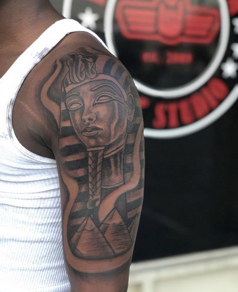 Egyptian Shoulder Tattoo Men, What Tattoo Should I Get, African Art Tattoo Ideas, Ancient Egyptian Tattoo Sleeve, Black Men Half Sleeve Tattoo Ideas, Egyptian Tattoo Men Arm, Black King Tattoo, Savage Tattoo For Men, African Warrior Tattoo For Men