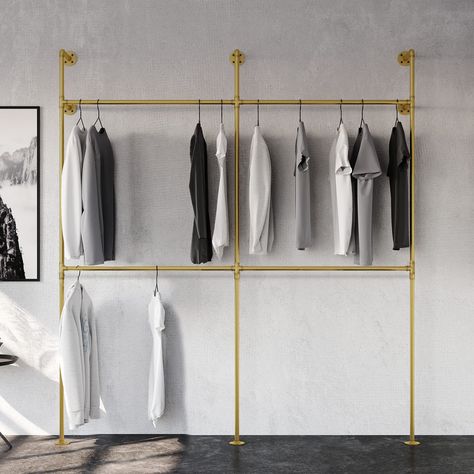 PRICES MAY VARY. INDUSTRIAL CLOTHING RACK - The pamo clothes rack wall mount is a modern heavy-duty wall clothing rack made of a high quality gold metal pipe. This industrial pipe clothing rack will match your room WALL MOUNTED - This gold clothing rack is a wall mounted clothes rack, which is perfect for hanging clothes. The clothes rack is securely mounted on the wall and features floor-standing, scratch-resistant supports for added stability EASY TO ASSEMBLE - Quick and simple setup, no addit Wall Clothing Rack, Industrial Pipe Clothing Rack, Industrial Closet, Industrial Clothing Rack, Hanging Clothes Rail, Industrial Clothing, Metal Clothes Rack, Heavy Duty Clothes Rack, Clothes Racks