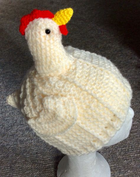 Using up all this white and cream yarn I made this cute chicken hat from the free pattern by Emily Snyder on https://www.ravelry.com/patterns/library/chicken-earflap-beanie Crochet Chicken Hat Pattern Free, Crochet Chicken Hat Pattern, Crochet Chicken Hat, Chicken Hats, Earflap Beanie, Cute Chicken, Hat Patterns Free, Crochet Chicken, Cute Chickens