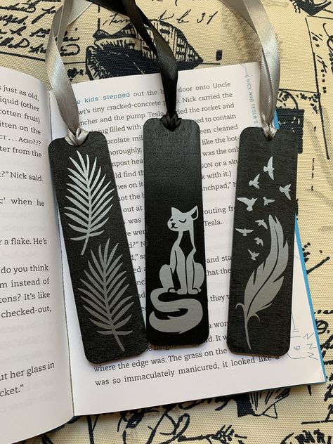 Black wooden bookmarks with silver design & ribbon Wooden Bookmarks, Bookmarks Diy, Handmade Bookmarks Diy, Vintage Bookmarks, Feather Bookmark, Felt Bookmark, Bookmarks For Books, Handmade Bookmarks, Creative Bookmarks