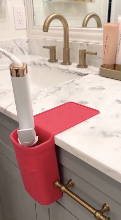 Here is one of my bathroom MUST HAVES! Check out how I hold my curling iron and straightener in this holder. Once they are cool then I fold it up and put it in my drawer! Diy Curling Iron Holder, Hot Tools Holder, Curling Iron Storage, Bathroom Must Haves, Hair Straightener Holder, Curling Iron Holder, Tall Drawers, Straighten Iron, My Bathroom