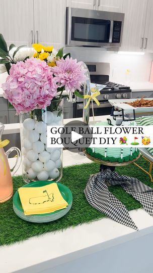 104K views · 5.5K reactions | Tag someone throwing a golf party 👇

This golf bouquet is the perfect centerpiece for a golf party or for any golf lover! 

Just layer two vases inside each other and then fill the outside layer with golf balls. 

I used plastic golf balls I bought in bulk (that I also used to make ice cubes - we love double use decor 😉) but you could use regular golf balls as well just make sure to pour them in more carefully! 

I’ve been posting DIY ideas all week for the Master’s so be sure to follow along! 

#themasters #diyhomedecor #floralarrangement #floralarrangements #amazonfinds #ltkparties #diyfloralarrangement #golfparty #golfpartyideas #fathersdayideas #howto #howtodiy | Shelby | Gift-in-a-Box Guide | parkspartyplanning · Original audio Golf Centerpieces, Golf Party, Floral Arrangements Diy, Golf Lover, Table Display, Golf Balls, Ice Cubes, Tag Someone, Golf Ball