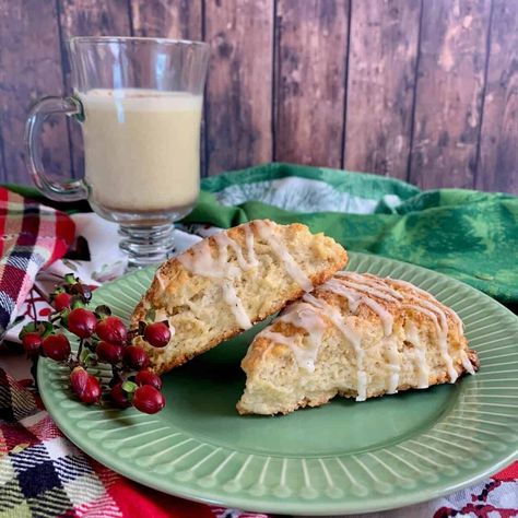 If you love the taste of eggnog, you'll love the taste of these Eggnog Scones topped with an eggnog glaze and sprinkled with nutmeg. The eggnog flavor is subtle and creamy with a hint of nutmeg spice. They're perfect for your holiday brunch and make a great hostess gift!Adapted from The First Year Eggnog Scones Recipe, Eggnog Scones, Eggnog Glaze, Dairy Free Egg Nog, Easy Chocolate Ganache, Blueberry Shortcake, Spiced Eggnog, Nutmeg Spice, How To Make Scones