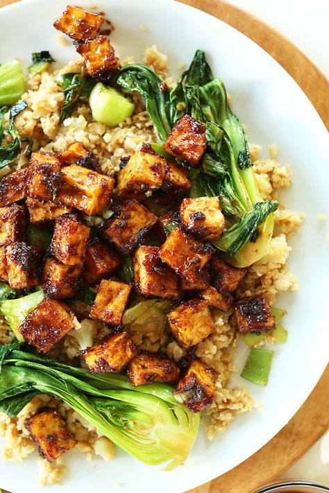 BAKED NOT FRIED crispy tofu in a 5-ingredient peanut glaze! So friggin' delicious especially over cauliflower fried rice!! #vegan #glutenfree Crispy Peanut Tofu, Tofu Cauliflower, Tofu Peanut, Cauliflower Rice Stir Fry, Peanut Tofu, Tofu Vegan, Cauliflower Fried, Vegan Tofu, Tofu Dishes