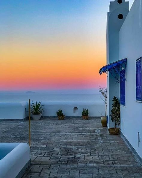 to the western bank of the Carthage's Gulf : Sidi Bou Saïd on #Sunset, serenely painting this uncommon view, ornamented with distant virgin Zembra Island.. From eastern #Tunisia.. Surprising day ahead!  photo credits unknown Milan Travel, Sidi Bou Said, Sea House, Carthage, Wallpaper Pictures, Beautiful Places In The World, Beautiful Buildings, Tunisia, Amazing Destinations