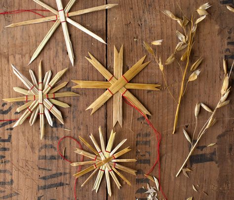 A tradition in Germany and Sweden, these simple, all-natural straw ornaments are beautiful, affordable and fairly easy to make. Make some to grace your Christmas tree, then make some to give away a... Straw Star, Willow Crafts, Straw Ornaments, Wheat Weaving, German Christmas Decorations, German Christmas Ornaments, Straw Crafts, Solstice Celebration, Polish Christmas