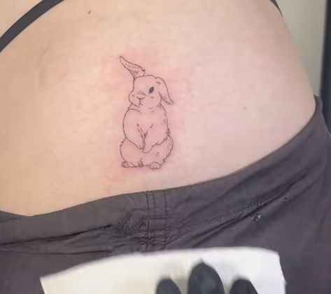 Bunny Hip Tattoo, Bunny Eating Strawberry Tattoo, Bunny Rabbit Tattoo Small, Dainty Rabbit Tattoo, Bunny Holding Flower Tattoo, Bunny Angel Tattoo, Red Bunny Tattoo, Realistic Bunny Tattoo, Stuffed Rabbit Tattoo