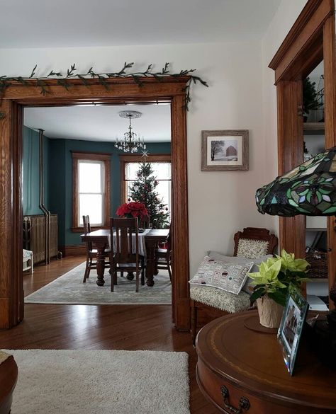 Farmhouse with dark wood trim Brown Molding Living Room, Dark Trim Dark Floors, Bedroom Colors With Wood Trim, Farmhouse Decor Dark Wood, Interior Design Living Room Dark Wood, Old Farmhouse Wood Trim, Paint Colors Natural Wood Trim, Craftsman Wood Trim, Dark Trim Around Windows